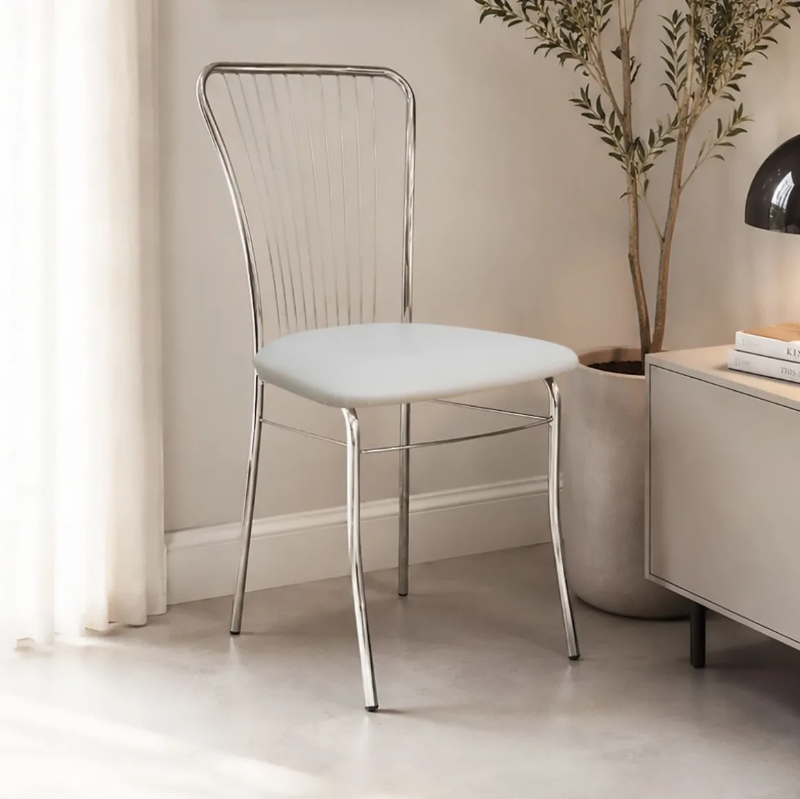 sedia in fusto cromato con sedile skai bianco
